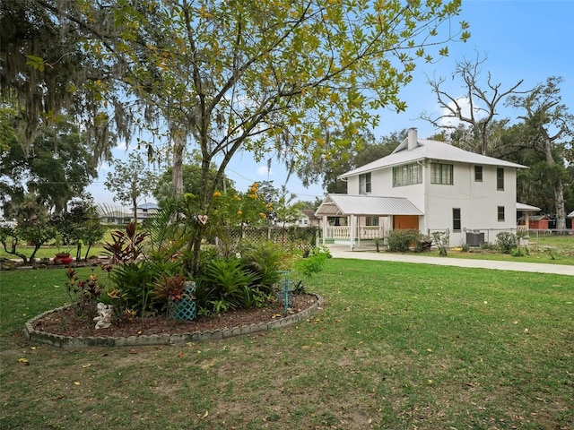 view of yard featuring central AC