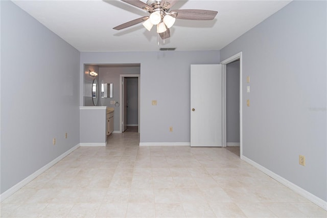 spare room featuring ceiling fan