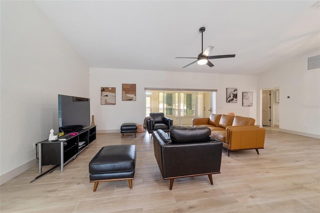 living room with light hardwood / wood-style floors, lofted ceiling, and ceiling fan