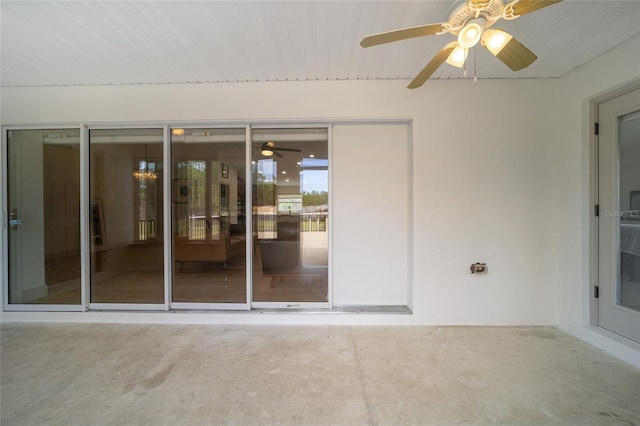 interior space with a patio and ceiling fan