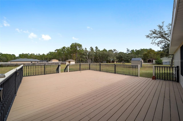 wooden deck with a yard