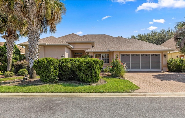 view of front of home with a garage