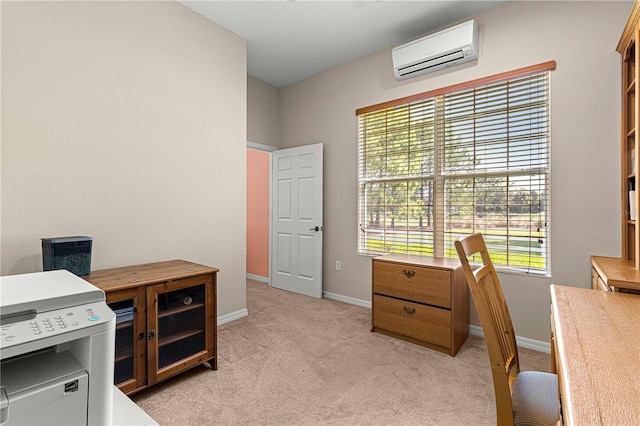 office area with light carpet, a healthy amount of sunlight, and a wall mounted air conditioner