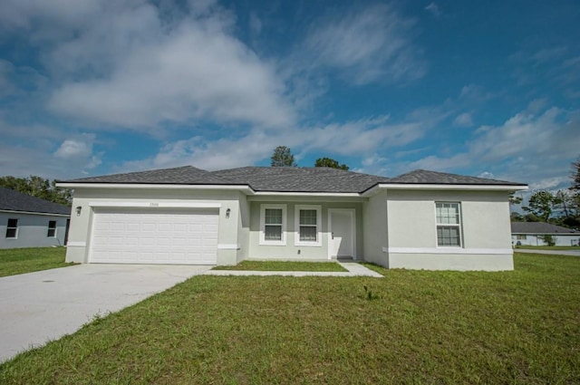 single story home featuring a front yard and a garage