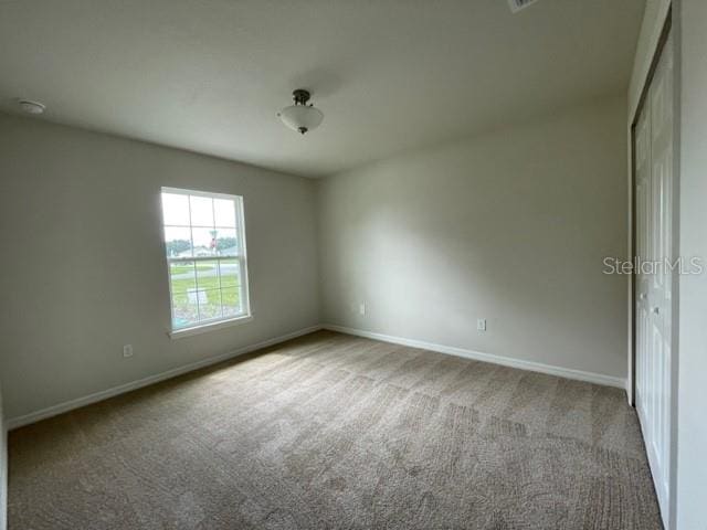 view of carpeted empty room