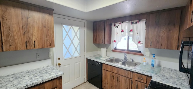 kitchen featuring dishwasher and sink