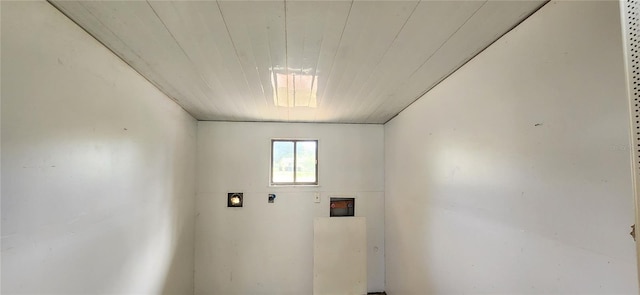 washroom with hookup for an electric dryer and wooden ceiling