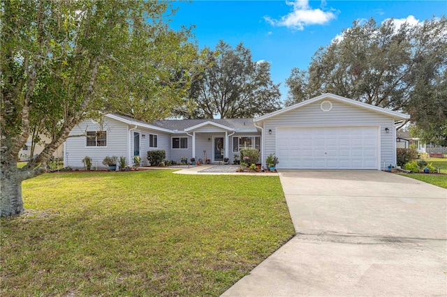 ranch-style home with a front lawn and a garage