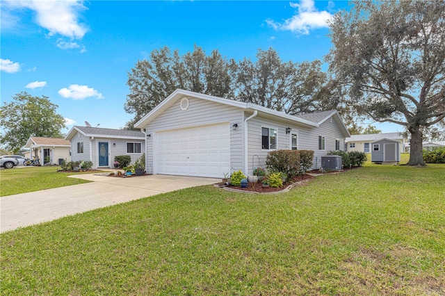 single story home featuring a front yard, a garage, and central air condition unit