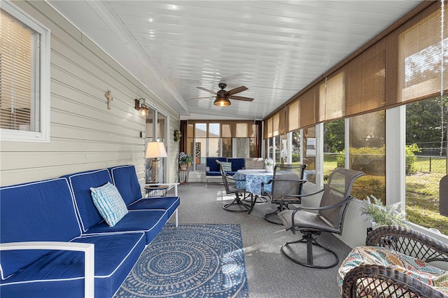 sunroom / solarium with ceiling fan