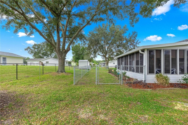 view of yard featuring a sunroom