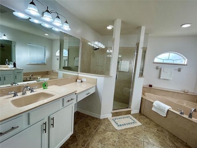 bathroom featuring plus walk in shower, vanity, and vaulted ceiling