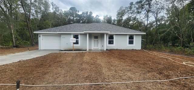 single story home featuring a garage