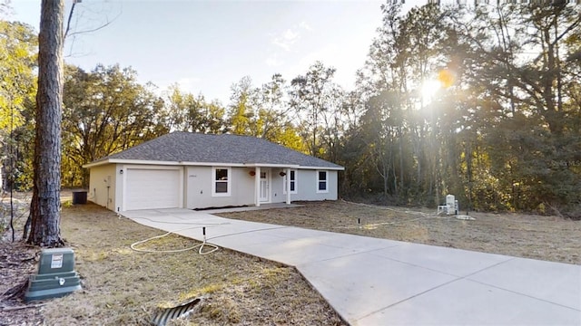 single story home with a garage