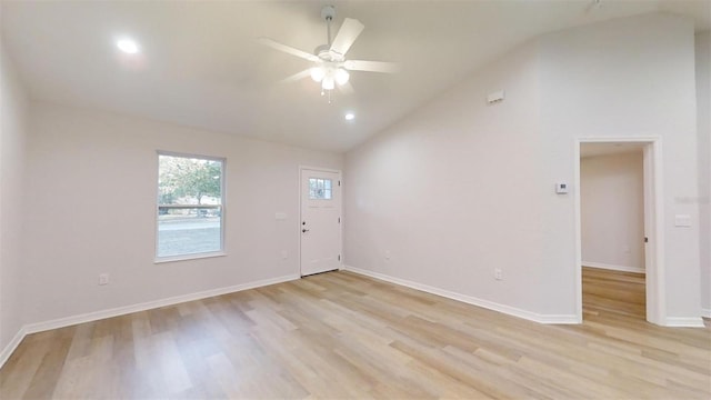 interior space with ceiling fan, high vaulted ceiling, and light hardwood / wood-style floors