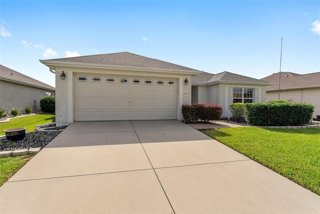 ranch-style house with a front lawn and a garage