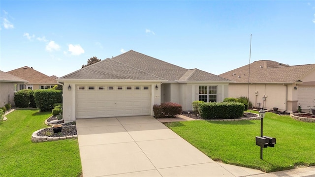 single story home with a garage and a front lawn