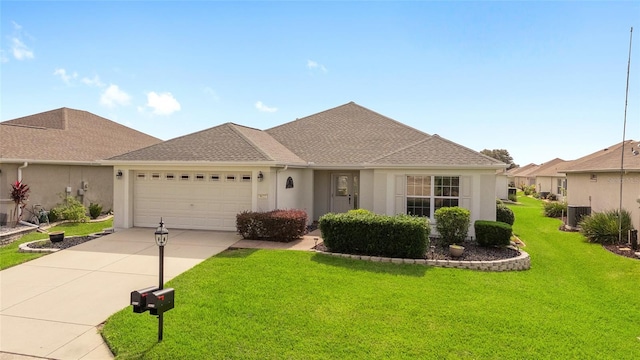 ranch-style house with a garage, a front lawn, and central AC unit