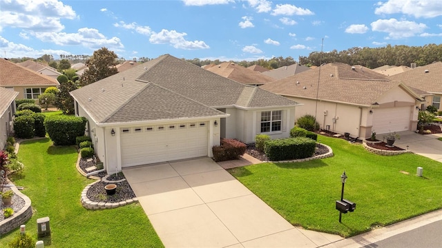 ranch-style house featuring a front yard and a garage