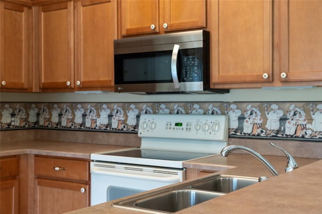 kitchen featuring white electric range