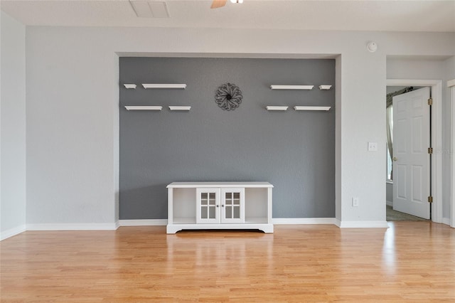 details with hardwood / wood-style flooring and ceiling fan