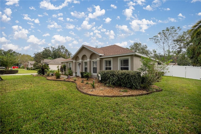 view of front of home with a front lawn