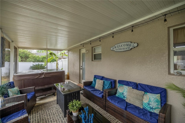 10291 SE 42nd Ter, Belleview, FL 34420 - sunroom / solarium featuring a hot tub and an outdoor hangout area