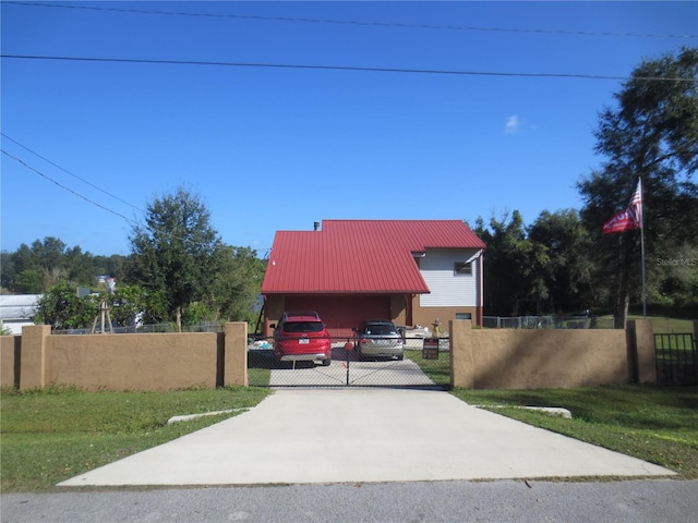 exterior space with a lawn and a garage