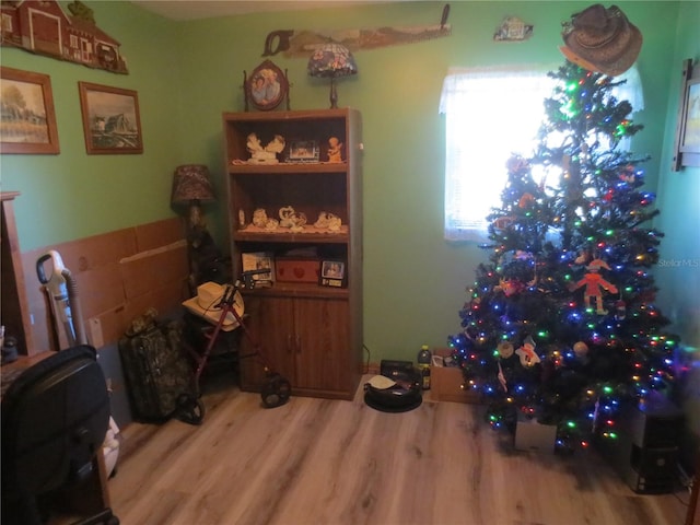 miscellaneous room with hardwood / wood-style floors