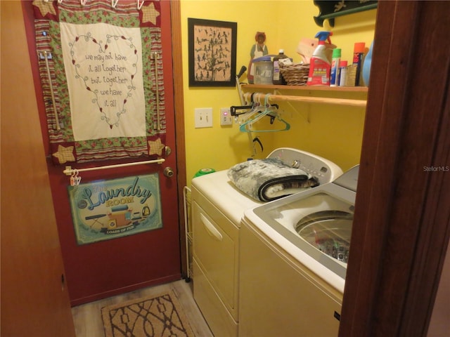 washroom with washer and clothes dryer