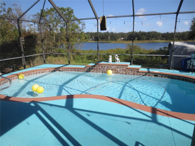 view of pool with a water view and glass enclosure