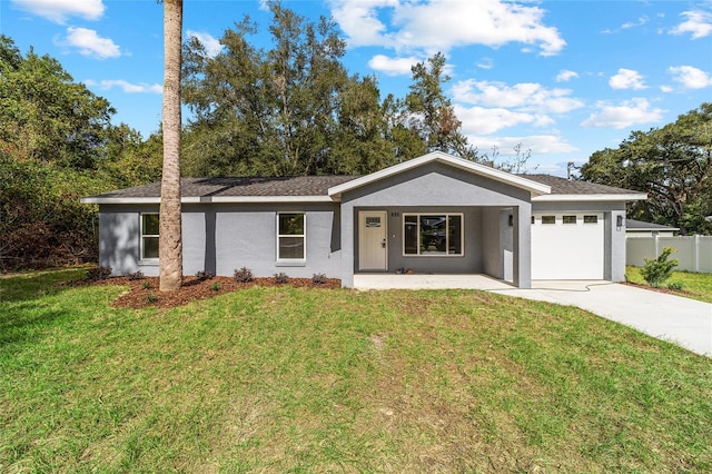 single story home featuring a front lawn and a garage