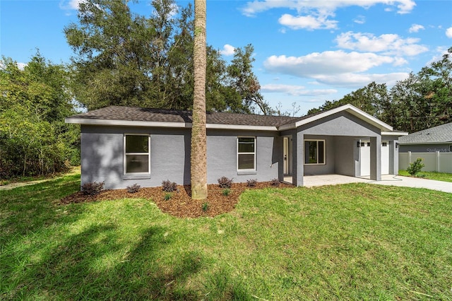 ranch-style house with a patio area and a front yard