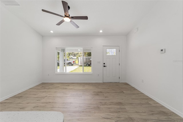 foyer featuring light hardwood / wood-style floors and ceiling fan