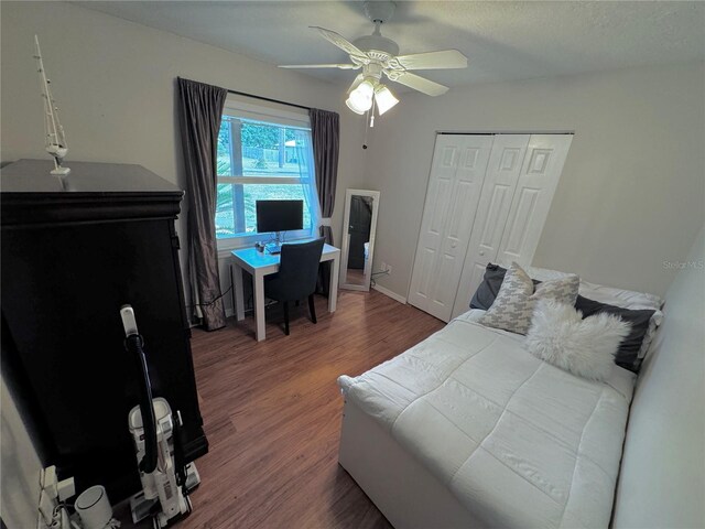 730 NE 18th Ave, Ocala, FL 34470 - bedroom with a ceiling fan, a closet, and wood finished floors