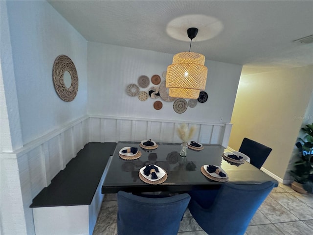 dining room with light tile patterned floors