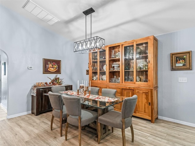 dining space featuring light hardwood / wood-style floors