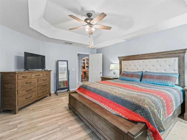 bedroom featuring ceiling fan and light wood-type flooring