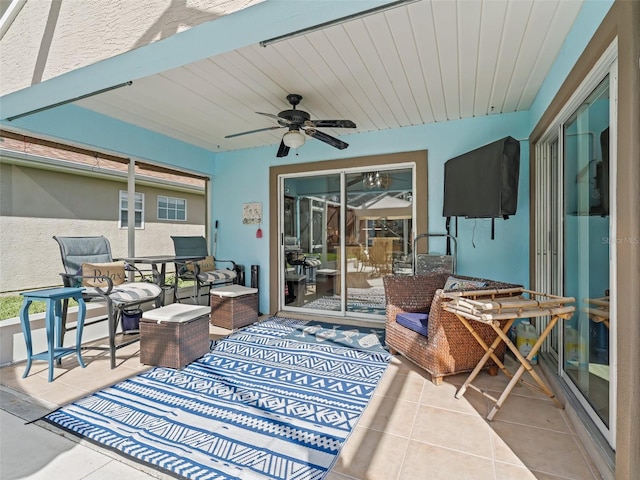 view of patio featuring ceiling fan