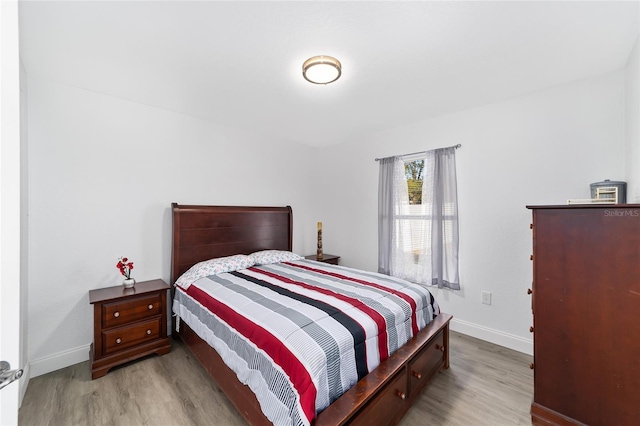 bedroom featuring light wood-type flooring