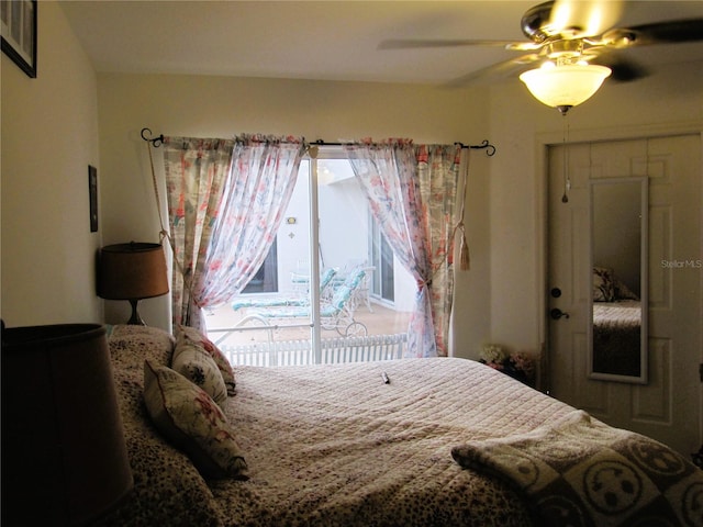 bedroom featuring ceiling fan and access to exterior