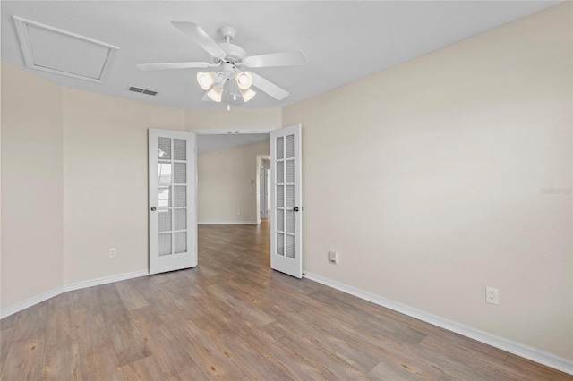 unfurnished room featuring light hardwood / wood-style floors and ceiling fan