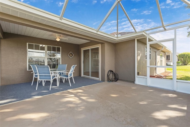 unfurnished sunroom featuring beam ceiling