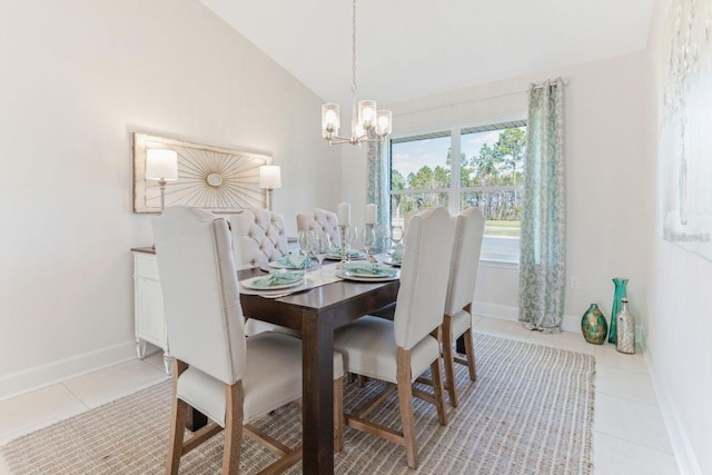 tiled dining room with vaulted ceiling and a notable chandelier