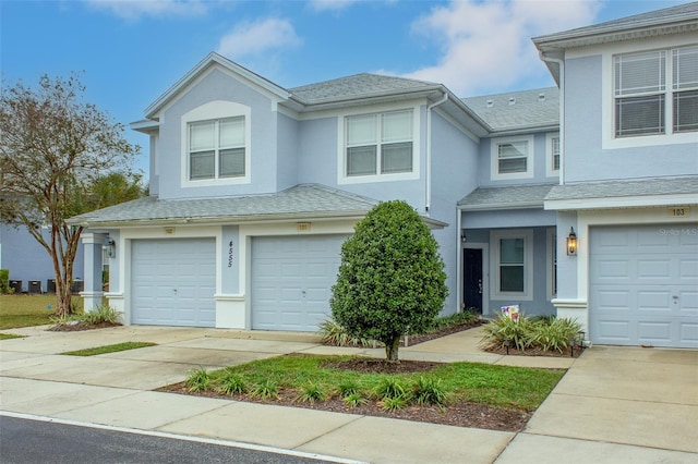 view of front of property featuring a garage