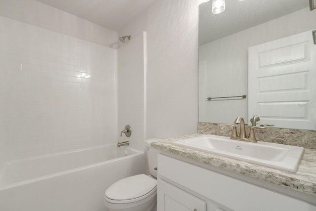 full bathroom with vanity, bathing tub / shower combination, and toilet