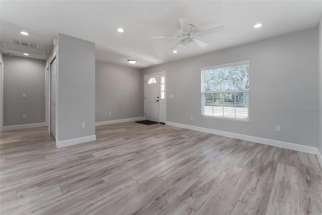 interior space with light hardwood / wood-style flooring and ceiling fan