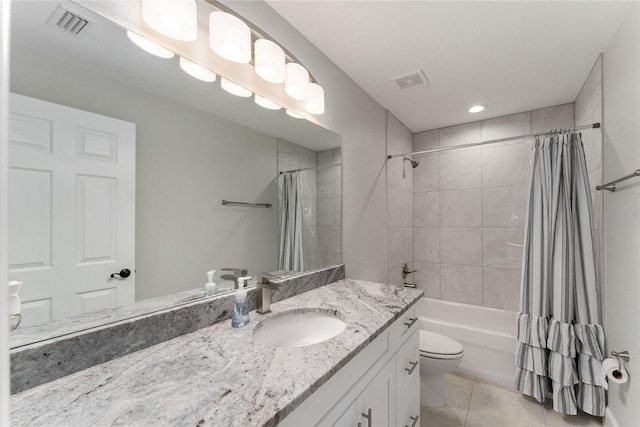 full bathroom with vanity, toilet, shower / bathtub combination with curtain, and tile patterned flooring