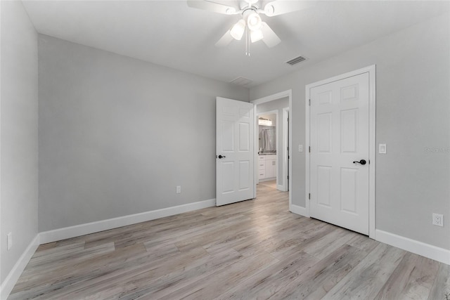 interior space with light hardwood / wood-style flooring and ceiling fan