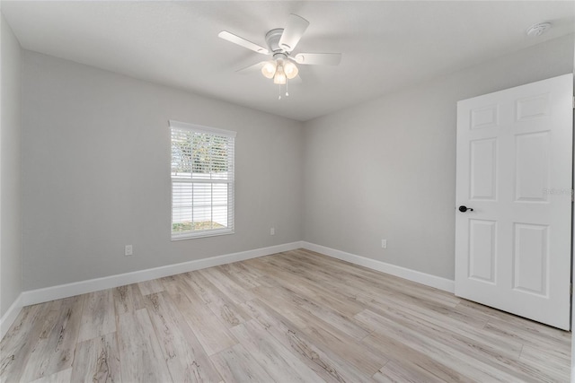 unfurnished room featuring ceiling fan and light hardwood / wood-style flooring